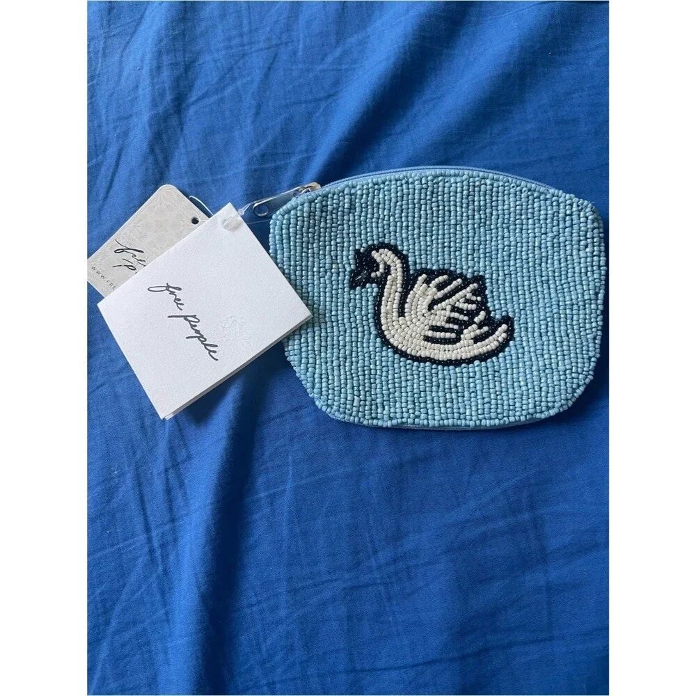 Free People Swan Lake breaded wallet blue NWT
